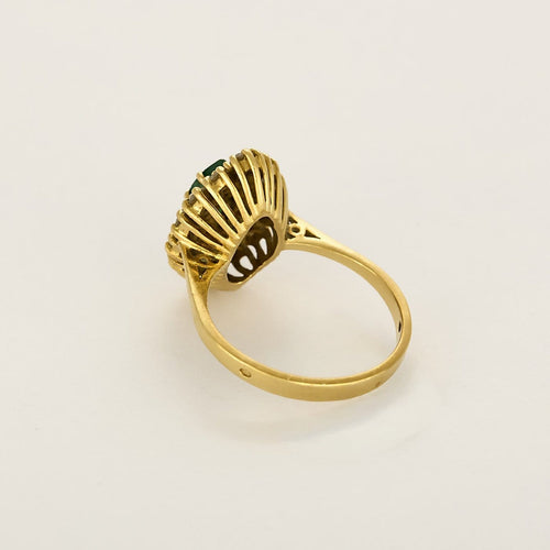 Bague 55 Bague navette en or jaune, émeraude et diamants 58 Facettes B260165