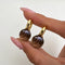 Boucles d'oreilles Jullie - Boucles d'oreilles boule en quartz brun 58 Facettes SER1038YG