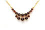 Collier Collier en or jaune 18 carats et grenats 58 Facettes 23840