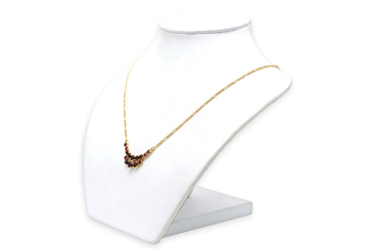 Collier Collier en or jaune 18 carats et grenats 58 Facettes 23840