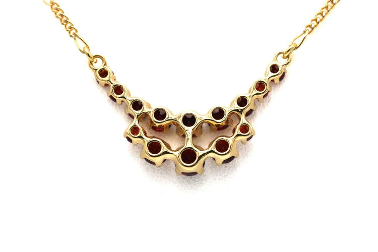 Collier Collier en or jaune 18 carats et grenats 58 Facettes 23840