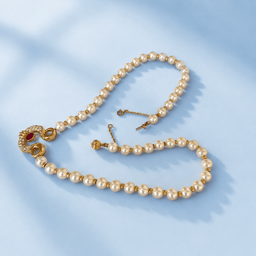 Collier Collier perles de culture en or jaune, rubis et diamants 58 Facettes 1786
