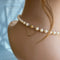 Collier Collier perles de culture en or jaune, rubis et diamants 58 Facettes 1786