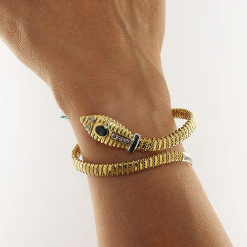 Bracelet Bracelet serpent semi-rigide en or jaune et blanc, diamants et saphirs 58 Facettes G3964