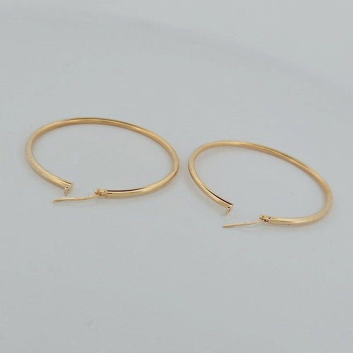 Boucles d'oreilles Créoles en or jaune 18 carats 58 Facettes 2752741