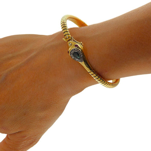 Bracelet Bracelet serpent semi-rigide en or jaune et blanc, saphir et diamants 58 Facettes G3965