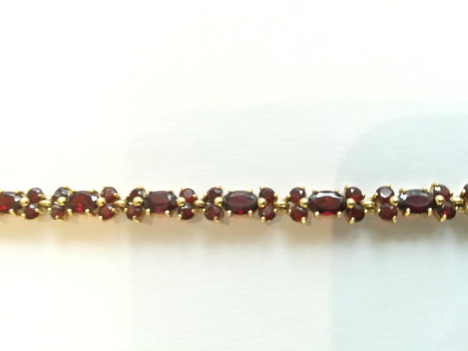 Boucles d'oreilles Demi-parure - Bracelet et boucles d'oreilles en or jaune et grenats 58 Facettes PAR 001
