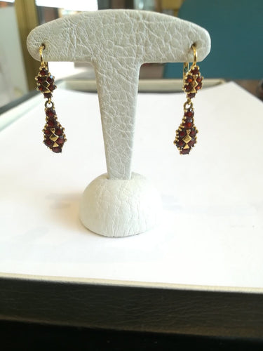 Boucles d'oreilles Demi-parure - Bracelet et boucles d'oreilles en or jaune et grenats 58 Facettes PAR 001