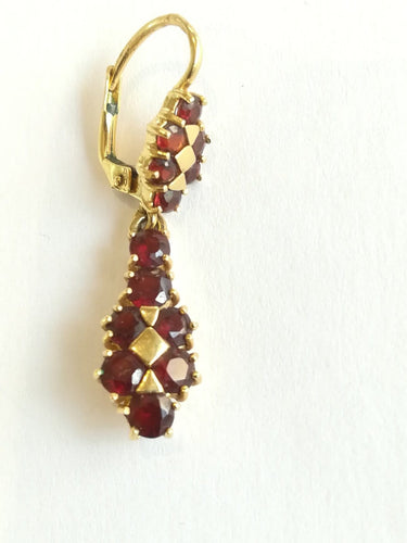 Boucles d'oreilles Boucles d'oreilles girandoles en or jaune et grenats 58 Facettes BO  001