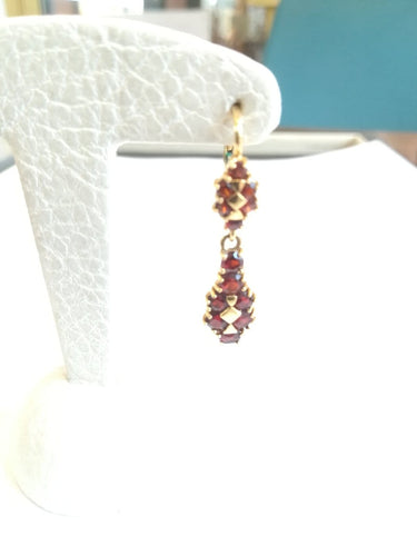 Boucles d'oreilles Boucles d'oreilles girandoles en or jaune et grenats 58 Facettes BO  001