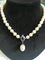 Boucles d'oreilles Demi-parure - Collier et boucles d’oreilles en or blanc et platine, perles, tanzanites, diamants 58 Facettes PAR  002