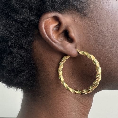 Boucles d'oreilles Boucles d'oreilles créoles torsadées en or jaune 58 Facettes 38737