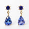 Boucles d'oreilles Boucles d'oreilles en or jaune 14 ct, tanzanites et saphirs bleus 58 Facettes E028