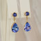 Boucles d'oreilles Boucles d'oreilles en or jaune 14 ct, tanzanites et saphirs bleus 58 Facettes E028