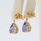 Boucles d'oreilles Boucles d'oreilles en or jaune 14 ct, tanzanites et saphirs bleus 58 Facettes E028