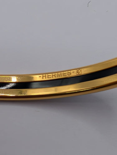 Bracelet Hermès - Bracelet jonc en plaqué or et émail 58 Facettes 1253