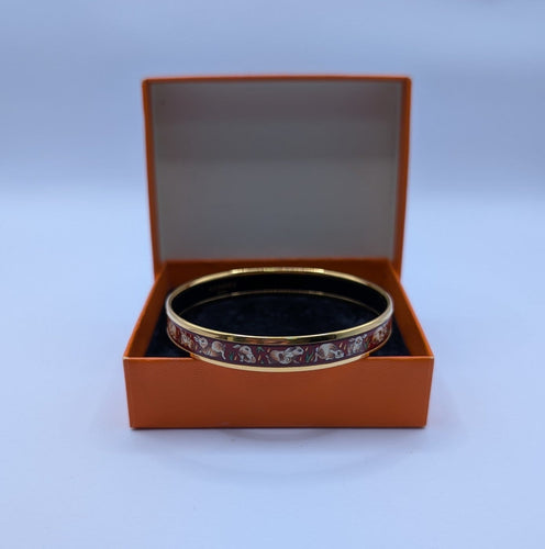 Bracelet Hermès 1001 Lapins - Jonc en plaqué or et émail 58 Facettes 1246