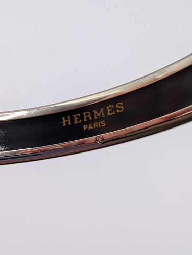 Bracelet Hermès Calèche - Bracelet jonc en acier et émail 58 Facettes 1250