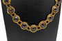 Collier Bootjes ketting - Collier hollandais en or jaune et grenats 58 Facettes 12229