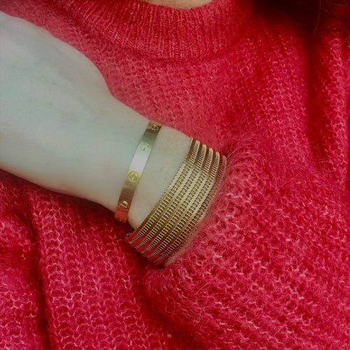 Bracelet Bracelet manchette souple tressé en or jaune 18K 58 Facettes REF2366-88