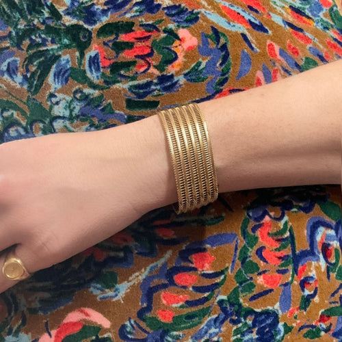 Bracelet Bracelet manchette souple tressé en or jaune 18K 58 Facettes REF2366-88
