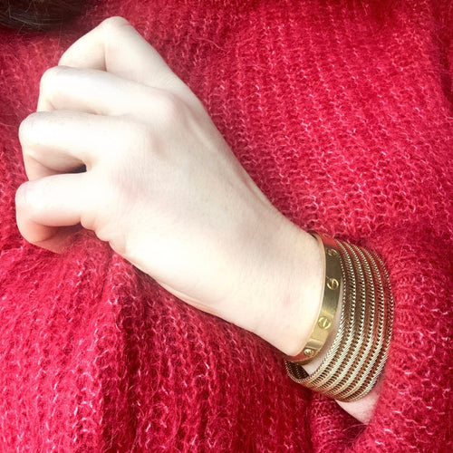 Bracelet Bracelet manchette souple tressé en or jaune 18K 58 Facettes REF2366-88