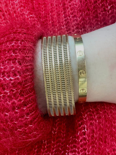 Bracelet Bracelet manchette souple tressé en or jaune 18K 58 Facettes REF2366-88