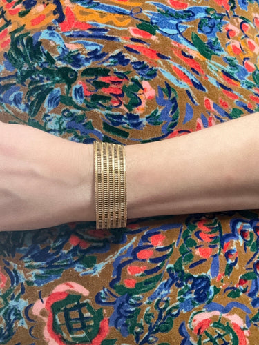 Bracelet Bracelet manchette souple tressé en or jaune 18K 58 Facettes REF2366-88