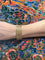 Bracelet Bracelet manchette souple tressé en or jaune 18K 58 Facettes REF2366-88