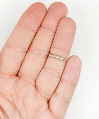 Bague 50.5 Bague antique en or rose 18k, platine, perle et diamants 58 Facettes A07421