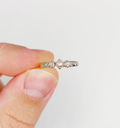 Bague 50.5 Bague antique en or rose 18k, platine, perle et diamants 58 Facettes A07421