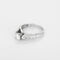 Bague solitaire en or gris, diamant 0,50 ct et petits diamants 58 Facettes B260255