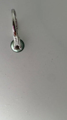 Bague 54 Bague en or blanc, perle de Tahiti et diamants 58 Facettes Bague 001