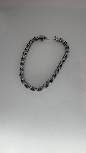Bracelet Bracelet rivière en or blanc, saphirs et diamants 58 Facettes Bracelet 001