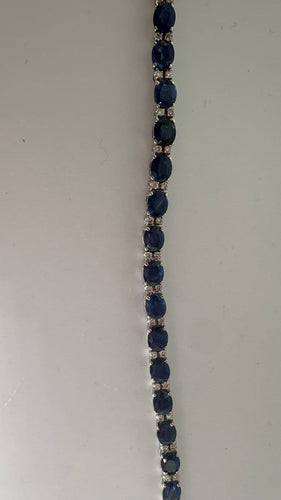 Bracelet Bracelet rivière en or blanc, saphirs et diamants 58 Facettes Bracelet 001