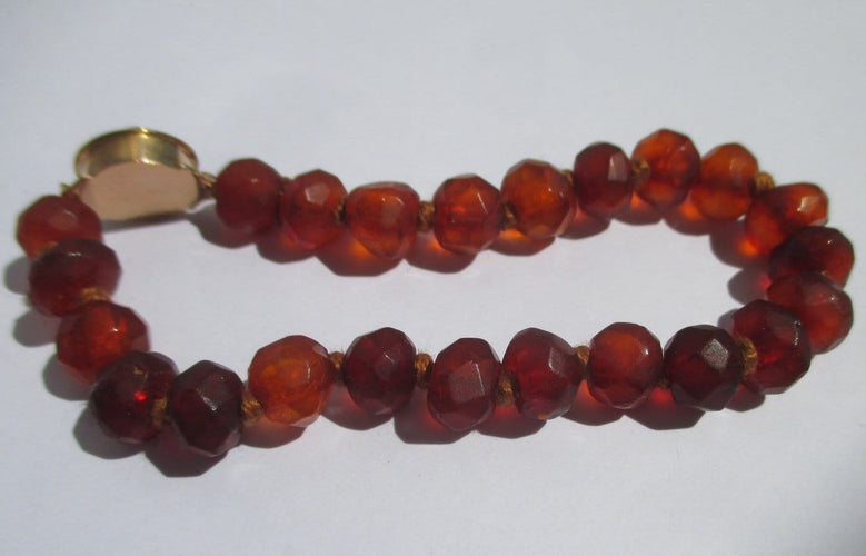 Bracelet Bracelet de perles d’ambre facettées en or rose 58 Facettes Bracelet