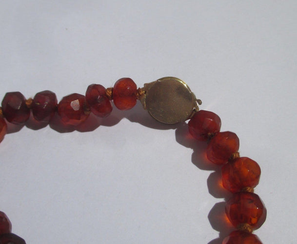 Bracelet Bracelet de perles d’ambre facettées en or rose 58 Facettes Bracelet