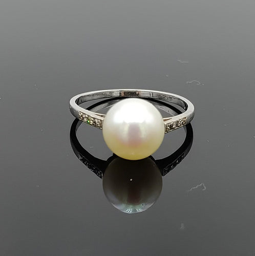 Bague 57 Bague ancienne en platine avec perle de culture et diamants 58 Facettes AX/18/0