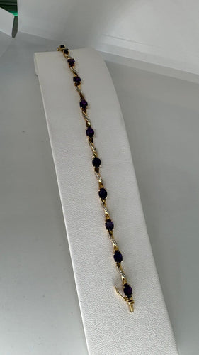 Bracelet Bracelet en deux ors 18 carats et améthystes 58 Facettes Bracelet 001