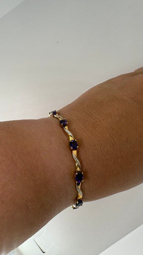 Bracelet Bracelet en deux ors 18 carats et améthystes 58 Facettes Bracelet 001