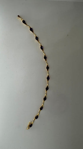 Bracelet Bracelet en deux ors 18 carats et améthystes 58 Facettes Bracelet 001