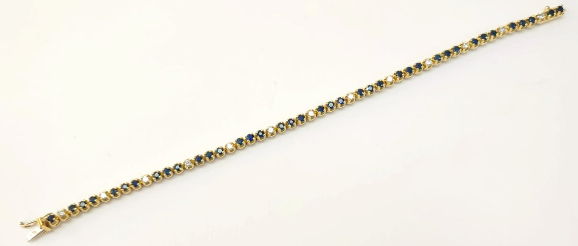 Bracelet Bracelet rivière en or jaune, saphirs et diamants 58 Facettes RIV-Saph-2335