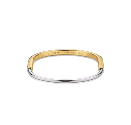 Bracelet Tiffany Lock - Bracelet jonc étroit en or jaune et or blanc 58 Facettes Tc