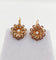 Boucles d'oreilles Dormeuses marguerite en or rose 18k et perles 58 Facettes A07454