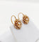 Boucles d'oreilles Dormeuses marguerite en or rose 18k et perles 58 Facettes A07454