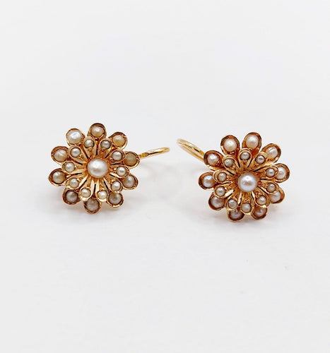 Boucles d'oreilles Dormeuses marguerite en or rose 18k et perles 58 Facettes A07454