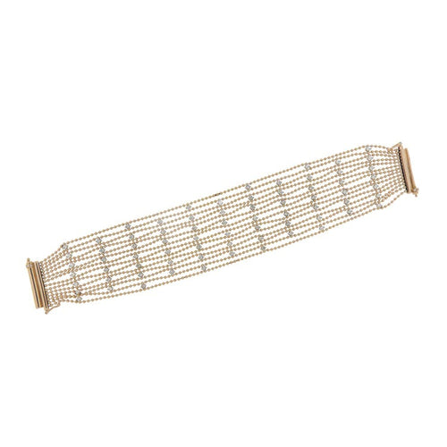 Bracelet Bracelet souple en or jaune et blanc avec diamants 58 Facettes G3971