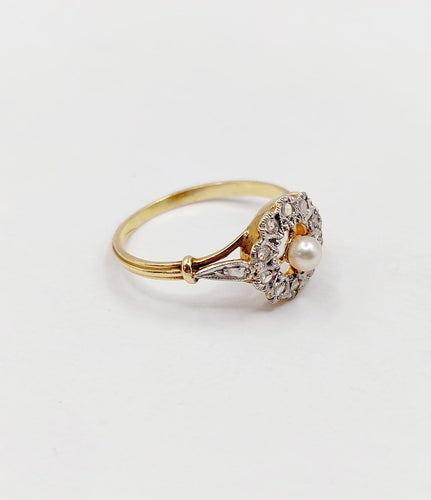 Bague 51 Bague marguerite antique en or 18k, platine, perle et diamants 58 Facettes A07460