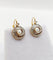 Boucles d'oreilles Dormeuses tourbillon en or 18K, perles et diamants taille rose 58 Facettes A06494