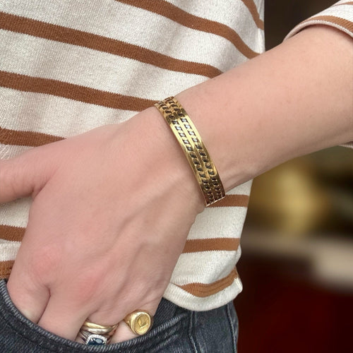 Bracelet Jonc ouvert tressé en or jaune 18K et acier bleui 58 Facettes REF24072-235